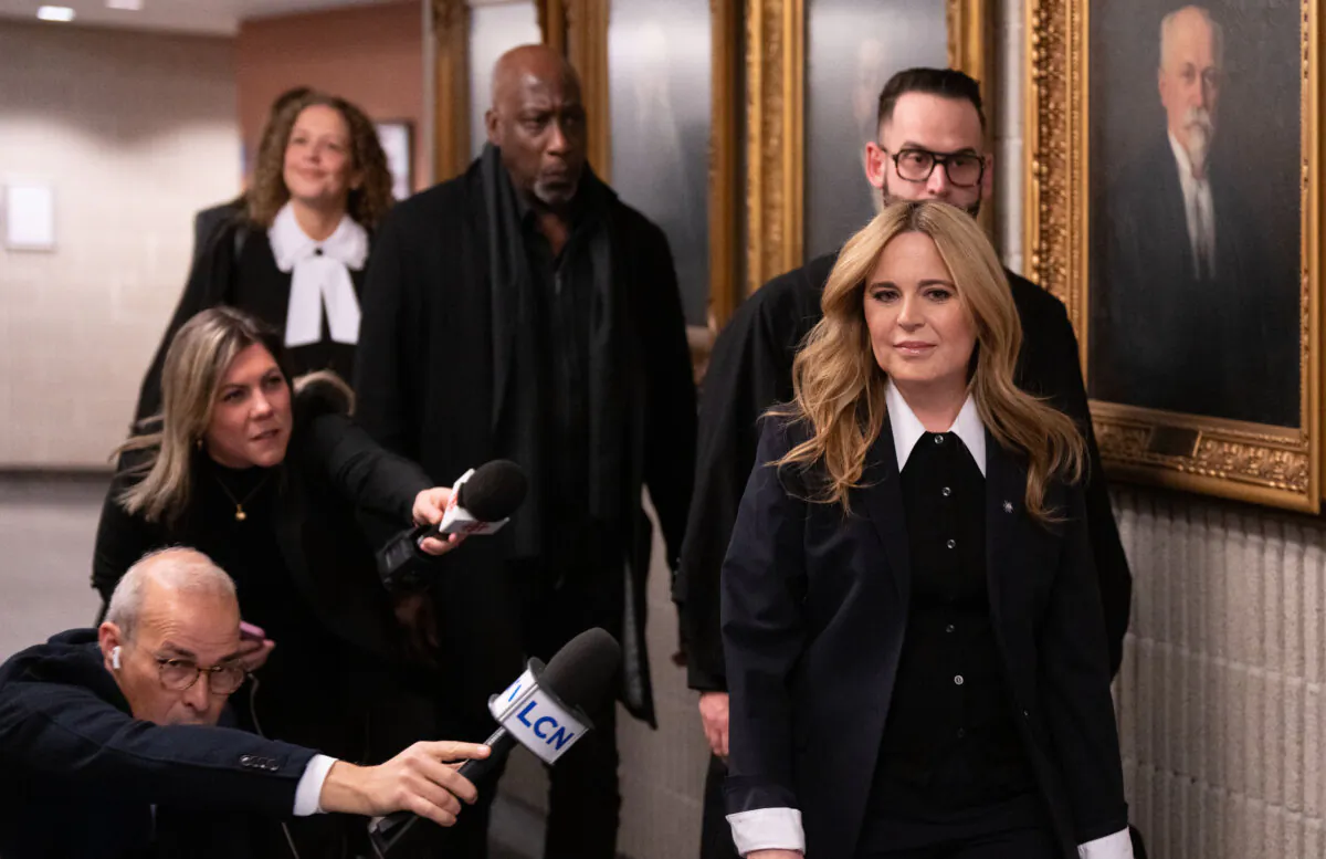 Quebec television personality Julie Snyder arrives at the courthouse for the civil trial for sexual assault against Just for Laughs founder Gilbert Rozon in Montreal on Dec. 19, 2024. (The Canadian Press/Christinne Muschi) 