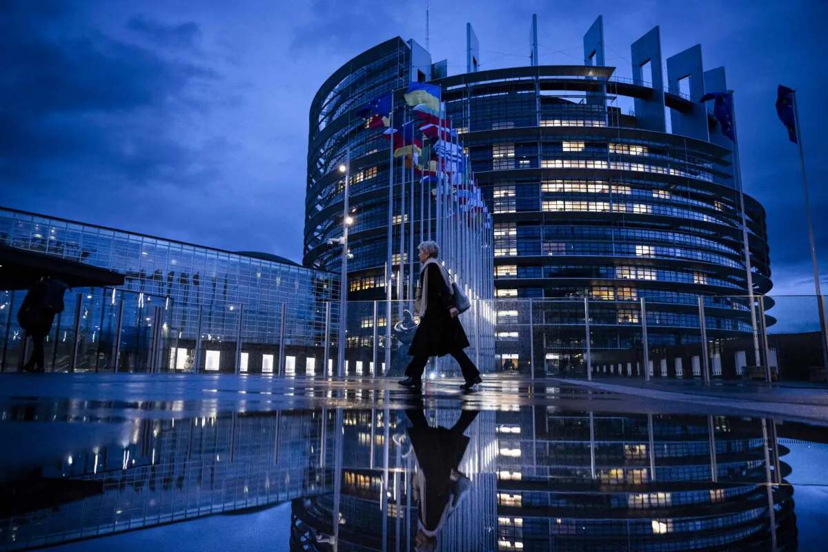 A person passes by the European Parliament building in Strasbourg, France, on Dec. 19, 2024. (Sebastien Bozon/AFP via Getty Images)