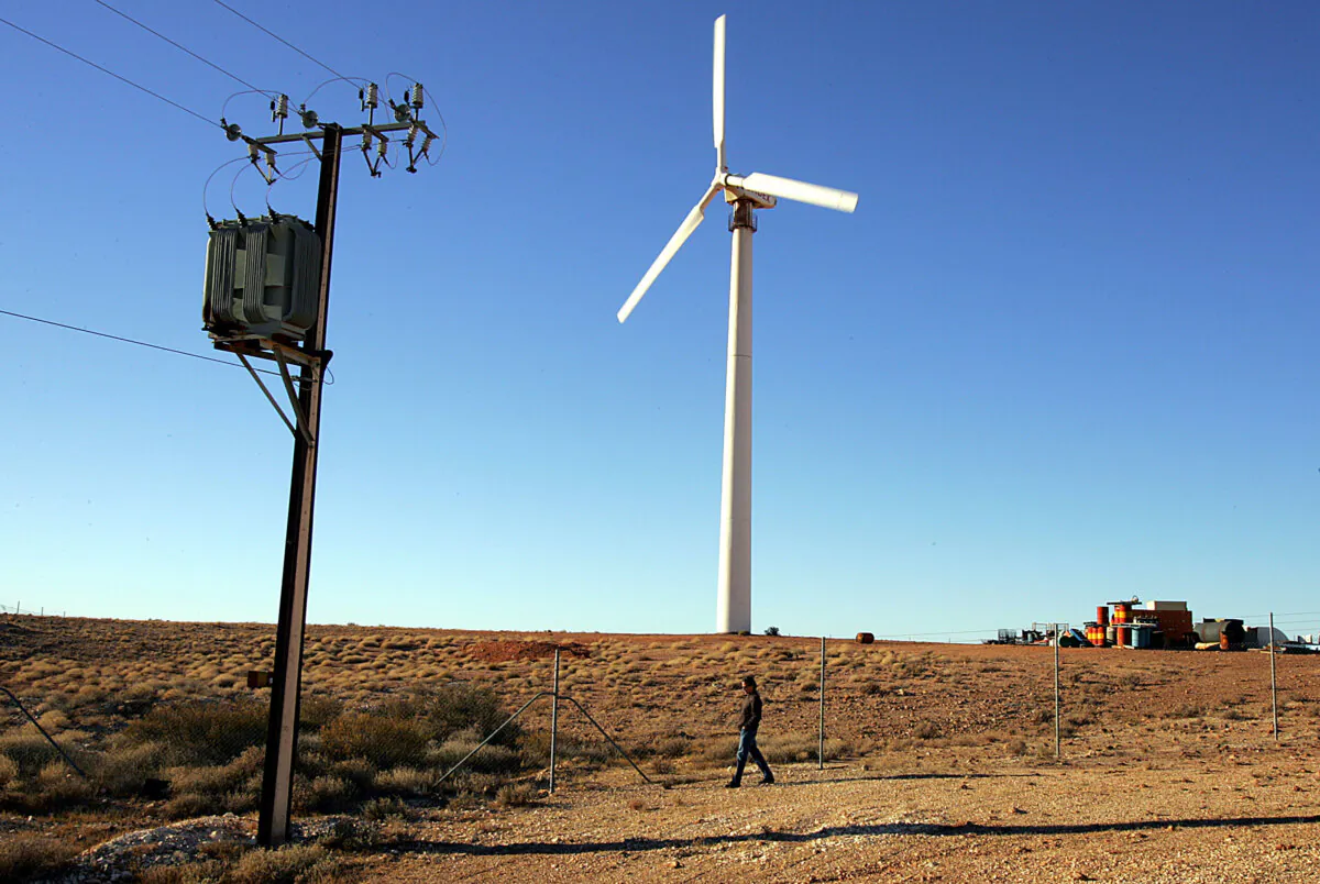 A single wind turbine provides electricity for 40 homes in the remote outback town of Coober Pedy, South Australia on July 5, 2005. (Torsten Blackwood/AFP via Getty Images)