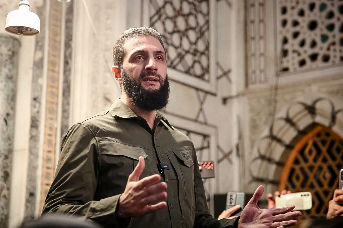 The leader of Syria's Islamist Hayat Tahrir al-Sham (HTS) Ahmed al-Sharaa, addresses a crowd at the Umayyad Mosque in Damascus, Syria, on Dec. 8, 2024. (Aref Tammawi / AFP)