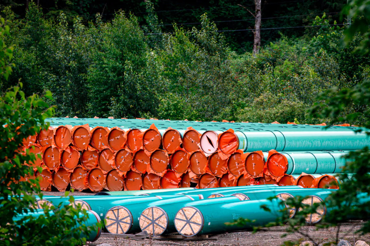 Pipes for the Trans Mountain Pipeline project sit in a storage lot outside of Hope, British Columbia, Canada, on June 6, 2021. (Cole Burston/AFP via Getty Images)