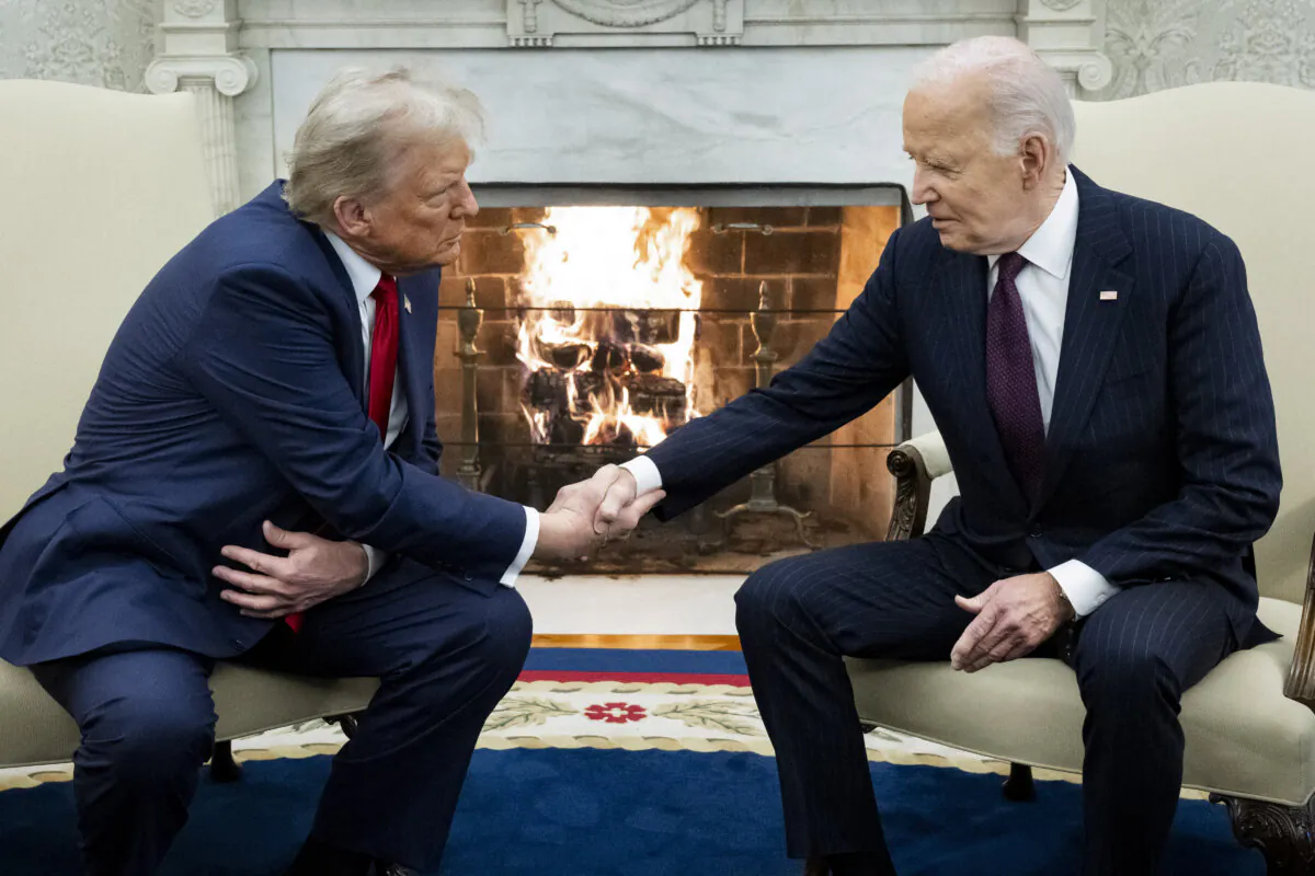 President Joe Biden shakes hands with President-elect Donald Trump during a meeting in the Oval Office of the White House in Washington on Nov. 13, 2024. (Saul Loeb/AFP via Getty Images)