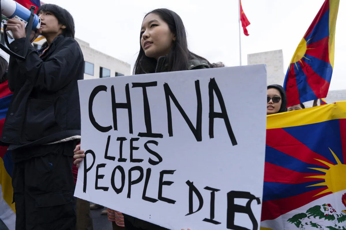 Demonstrators participate in a rally to commemorate the failed 1959 Tibetan uprising against China's rule, outside of the Chinese Embassy in Washington on March 10, 2023. (AP Photo/Jose Luis Magana)