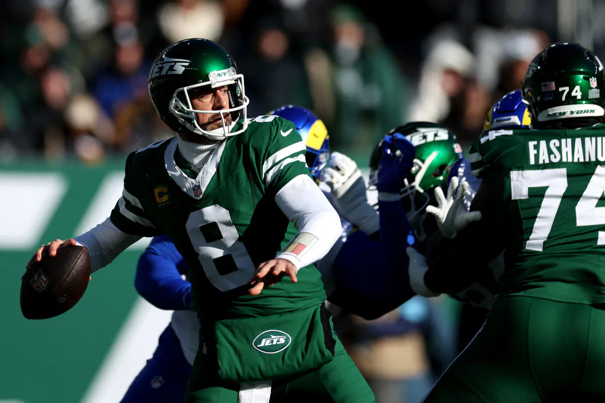 Aaron Rodgers (8) of the New York Jets throws a pass against the Los Angeles Rams at MetLife Stadium in East Rutherford, N.J., on Dec. 22, 2024. (Luke Hales/Getty Images)