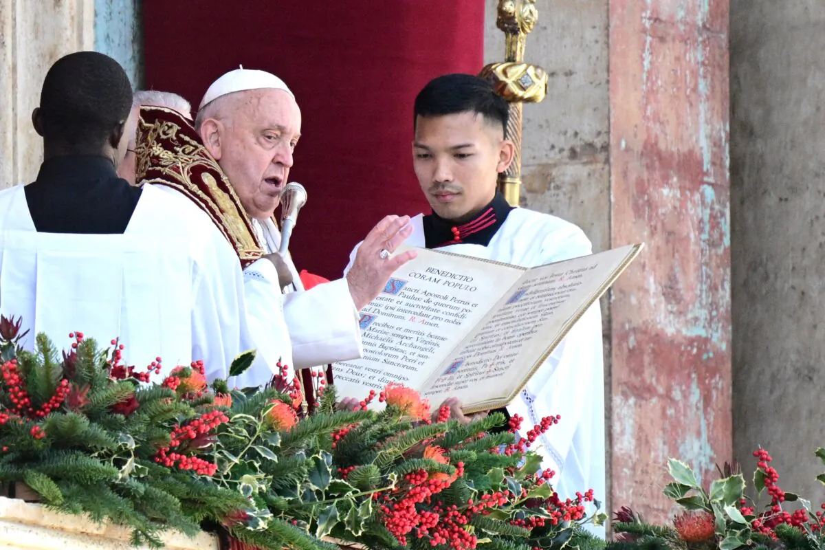Pope Francis delivers the Urbi et Orbi message and blessing to the city and the world from the main balcony of St. Peter's basilica as part of Christmas celebrations, at St Peter's square in the Vatican on Dec. 25, 2024. (Tiziana Fabi/AFP via Getty Images)