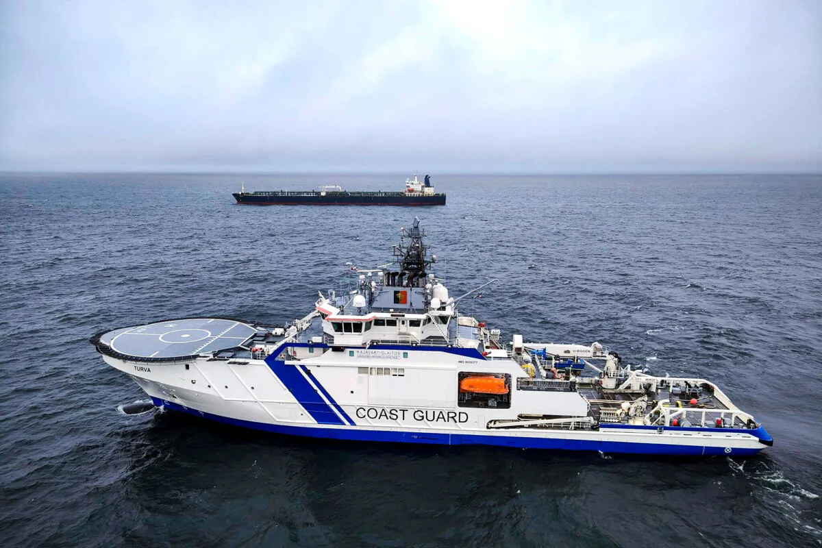 The Finnish Border Guard ship Turva (in the foreground) keeps an eye on the Russian tanker Eagle S, in the Baltic Sea south of Porkkalanniemi, Finland, on Dec. 26, 2024. (Rajavartiosto via AP)