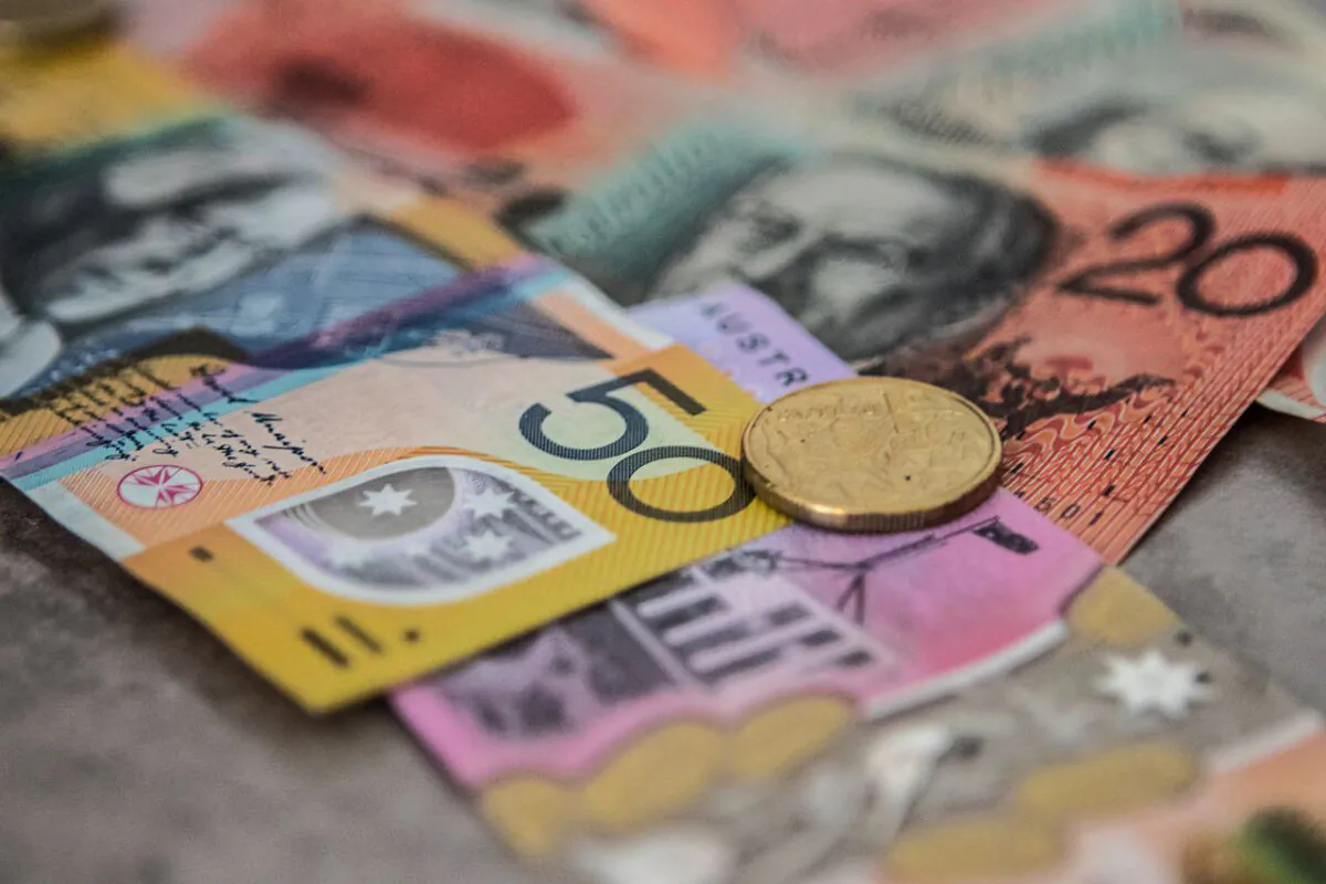 Australian banknotes and a one dollar coin. (Squirrel_photos/pixabay)