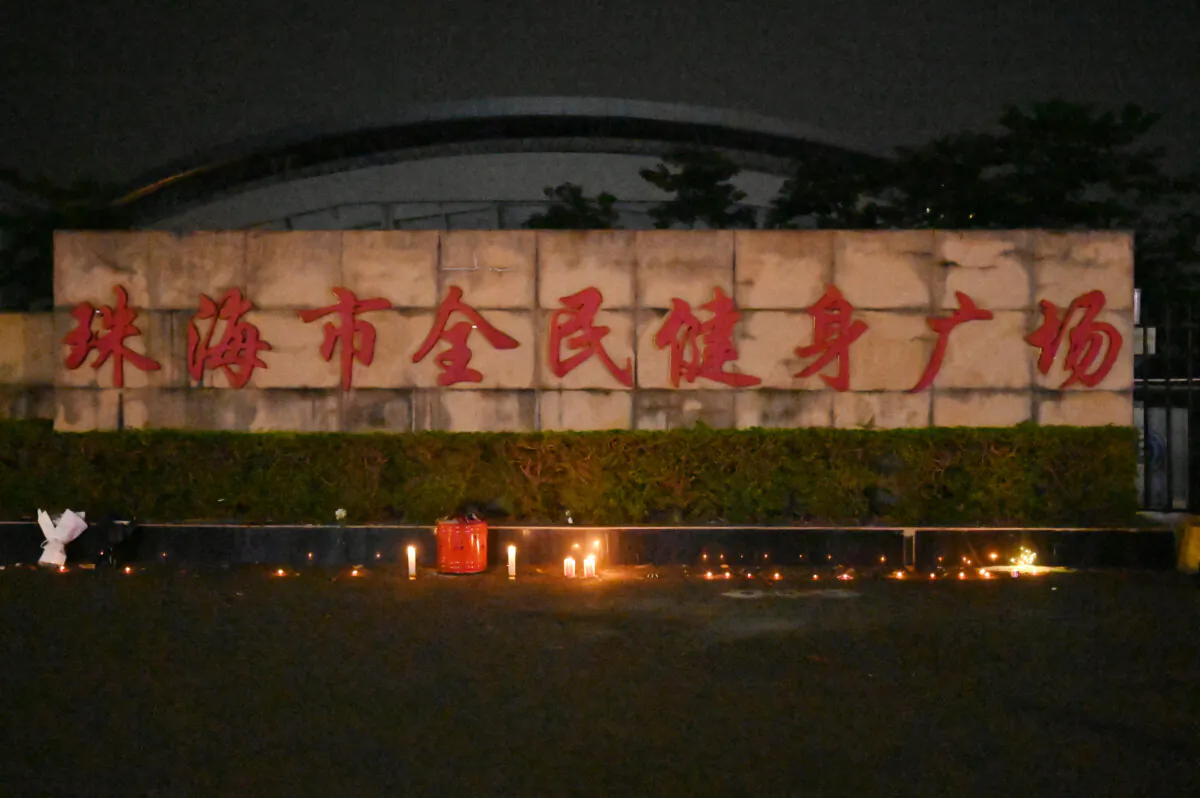 Candles left outside the Zhuhai Sports Centre, a day after a car rammed through the site killing dozens, in Zhuhai, Guangdong Province, China, on Nov. 12, 2024. (Michael Zhang/AFP via Getty Images)