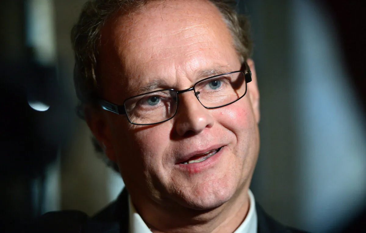 New Brunswick MP Wayne Long speaks to reporters as he leaves a Liberal caucus meeting on Parliament Hill, in Ottawa on Oct. 16, 2017. (The Canadian Press/Sean Kilpatrick)  