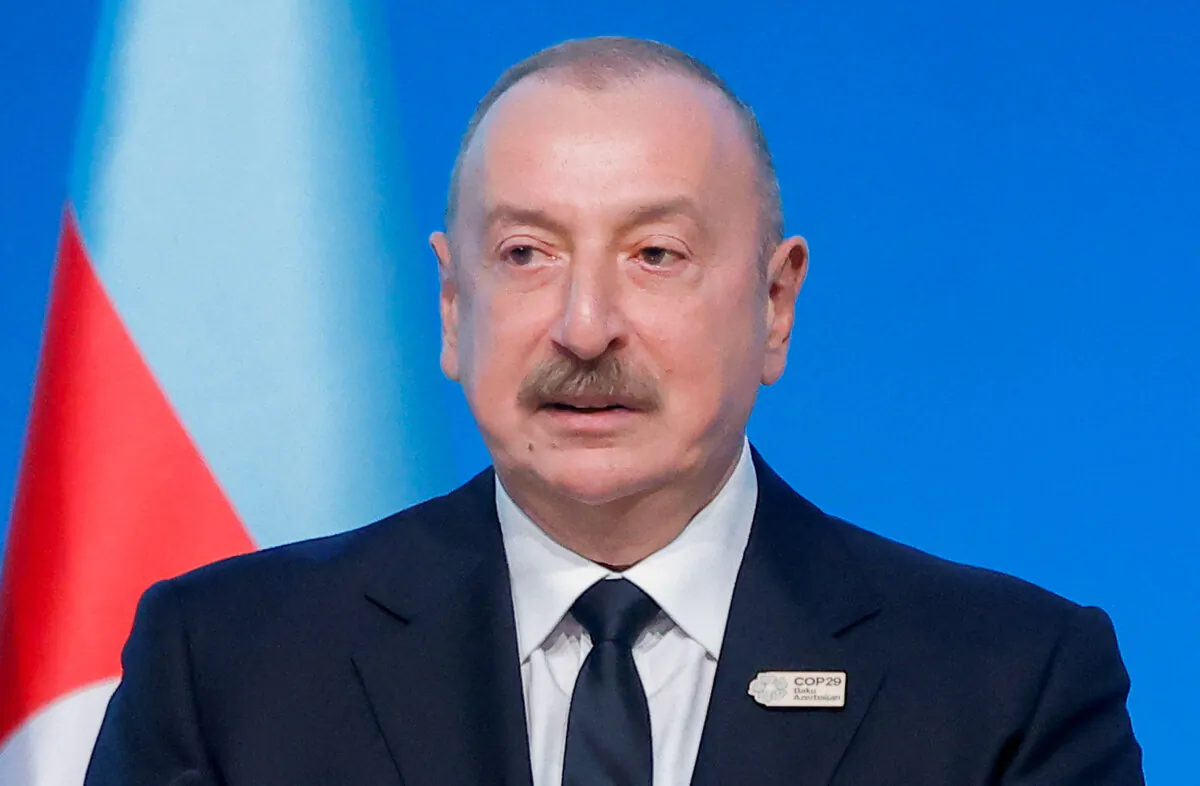 Azerbaijan's President Ilham Aliyev speaks during the Opening Ceremony of the United Nations climate change conference COP29 in Baku, Azerbaijan, on Nov. 12, 2024. (Maxim Shemetov/Reuters)