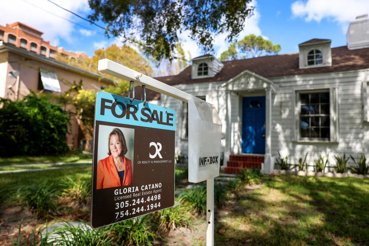 A 'for sale' sign is displayed in front of a home in Miami, Fla., on Feb. 22, 2023. (Joe Raedle/Getty Images)
