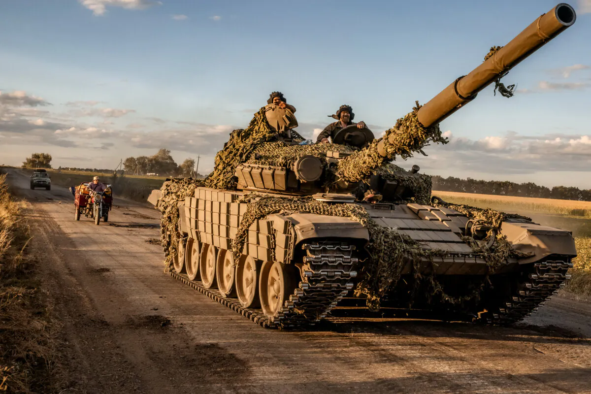 Ukrainian servicemen operate a Soviet-made T-72 tank in the Sumy region of Ukraine, near the border with Russia, on Aug. 12, 2024. (Roman Pilipey/AFP via Getty Images)