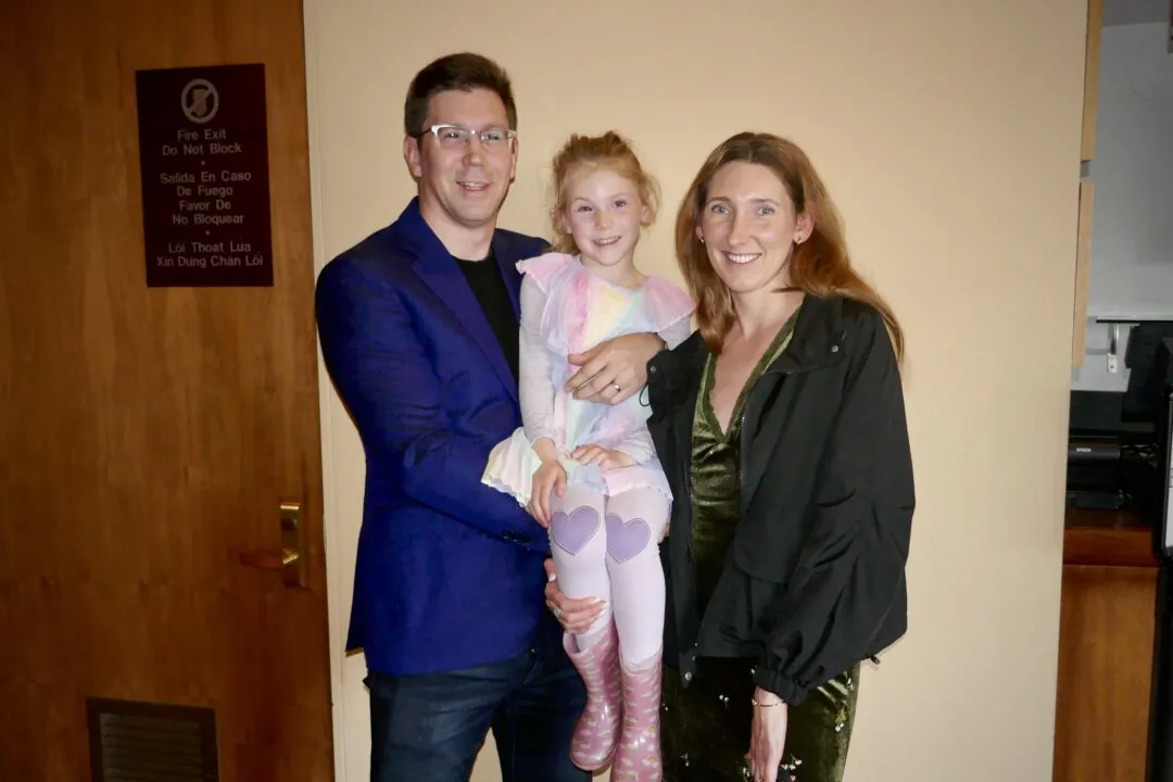 Andrew and Doria Harvey with their daughter attend Shen Yun Performing Arts in San Jose, Calif., on Dec. 30, 2024. (Steve Ispas/The Epoch Times)