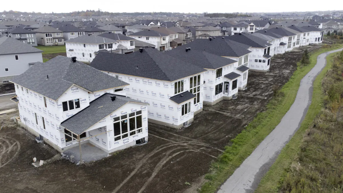 Homes under construction in a new suburb in Ottawa, on Oct. 15, 2021. (The Canadian Press/Adrian Wyld)