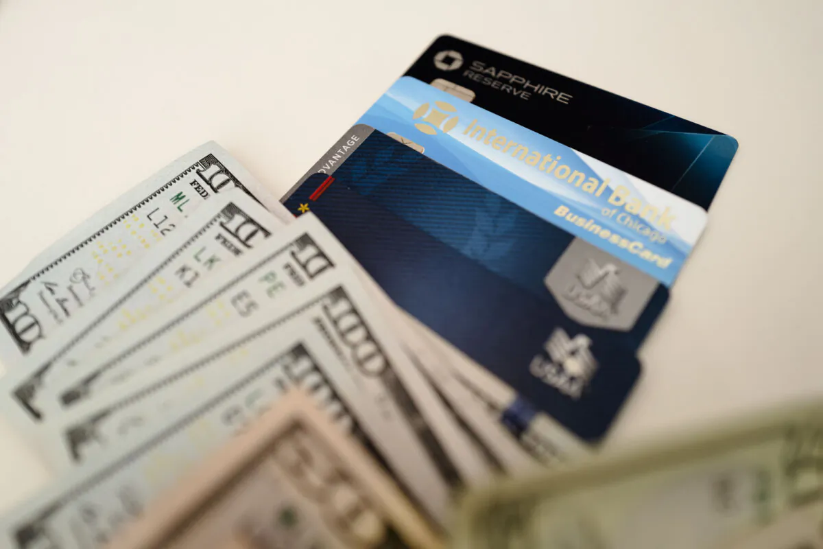 U.S. dollar bills, credit cards, and debit cards in Washington on Oct. 4, 2024. (Madalina Vasiliu/The Epoch Times)