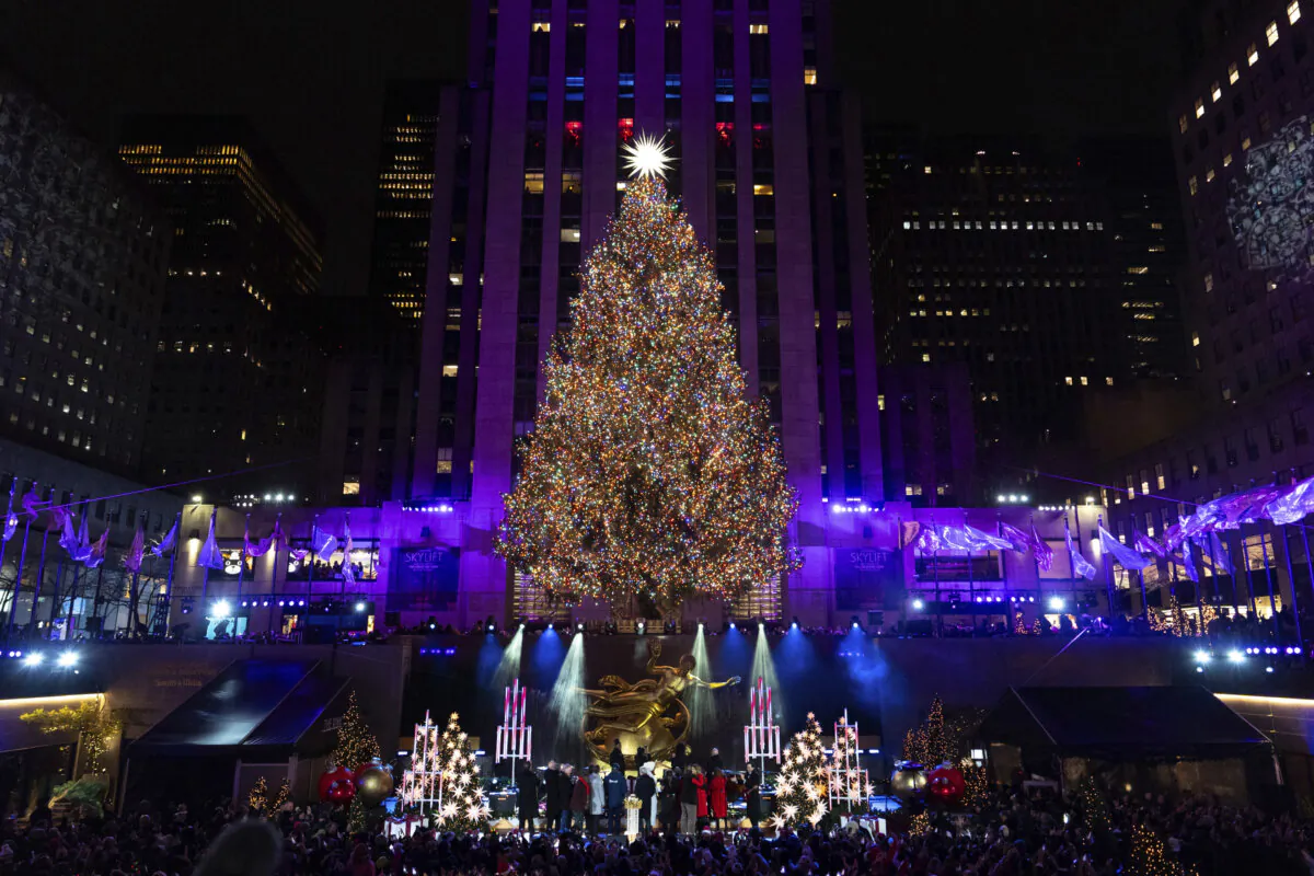 The Rockefeller Center Christmas tree is lit during the 92nd annual Rockefeller Center Christmas tree lighting ceremony, in New York on Dec. 4, 2024. (Julia Demaree Nikhinson/AP Photo)