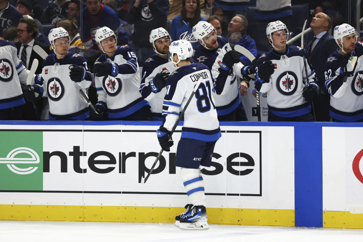 Winnipeg Jets left wing Kyle Connor (81) celebrates after his goal during the second period of an NHL hockey game against the Buffalo Sabres, Thursday, Dec. 5, 2024, in Buffalo, N.Y. (Jeffrey T. Barnes/AP Photo)