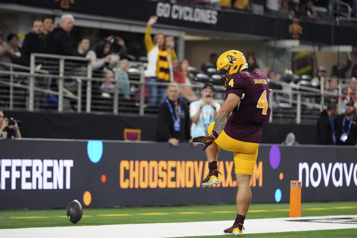 Arizona State running back Cam Skattebo (4) celebrates after running the ball for a touchdown against Iowa State in the first half of the Big 12 Conference championship NCAA college football game, in Arlington, Texas, Saturday Dec. 7, 2024. (Julio Cortez/AP Photo)