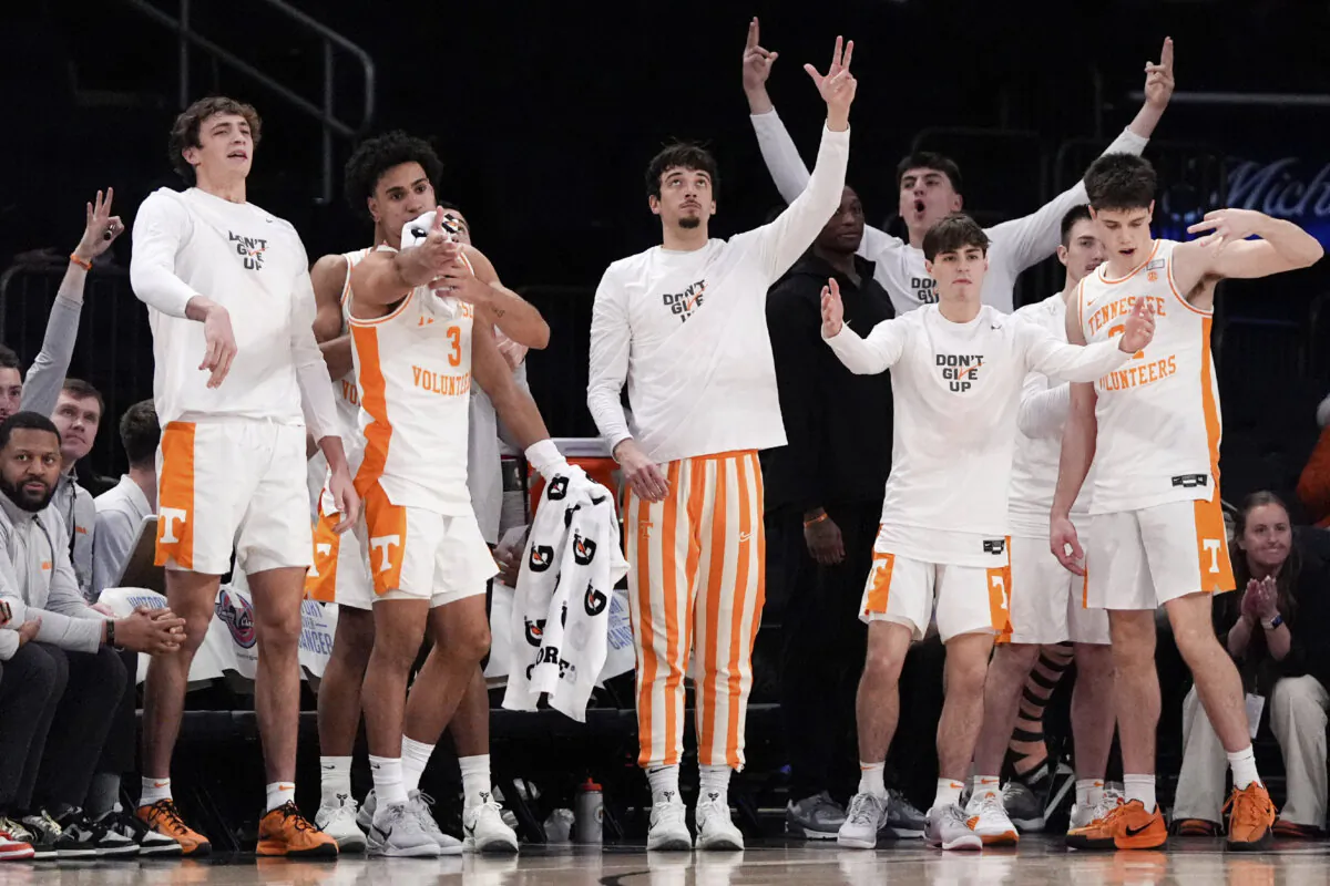 Tennessee players react during the first half of an NCAA college basketball game against Miami in New York, on Dec. 10, 2024. (Julia Demaree Nikhinson/AP Photo)