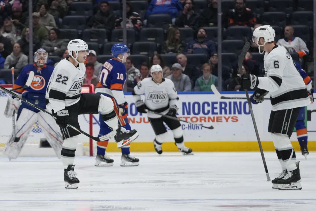 Los Angeles Kings left wing Kevin Fiala (22) celebrates with Joel Edmundson (6) after scoring a goal during the second period of an NHL hockey game against the New York Islanders in Elmont, N.Y., on Dec. 10, 2024. (Frank Franklin II/AP Photo)