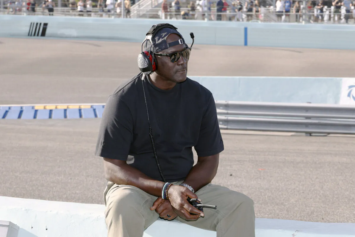 Car owner Michael Jordan watches from the pits during a NASCAR Cup Series auto race at Homestead-Miami Speedway in Homestead, Fla., on Oct. 27, 2024. (Terry Renna/AP Photo)