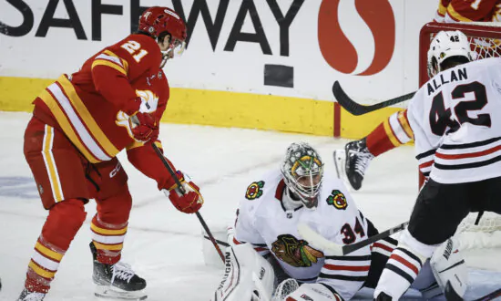 Flames Get Goals From 6 Players in a 6–4 Victory Over the Blackhawks