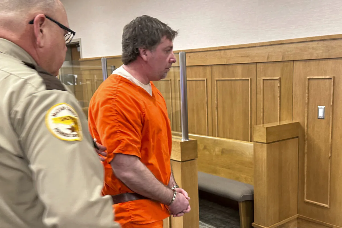 Deputies lead Ian Cramer (C) out of a courtroom at the Mercer County Courthouse in Stanton, N.D., on Dec. 30, 2024, after his sentencing.  (Jack Dura/AP Photo)