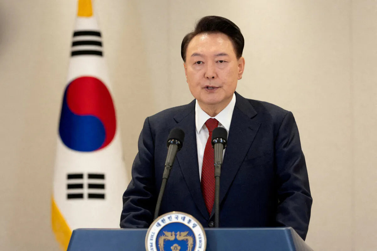 South Korean President Yoon Suk Yeol delivers an address to the nation at the Presidential Office in Seoul, South Korea, on Dec. 12, 2024. (The Presidential Office/Handout via Reuters)