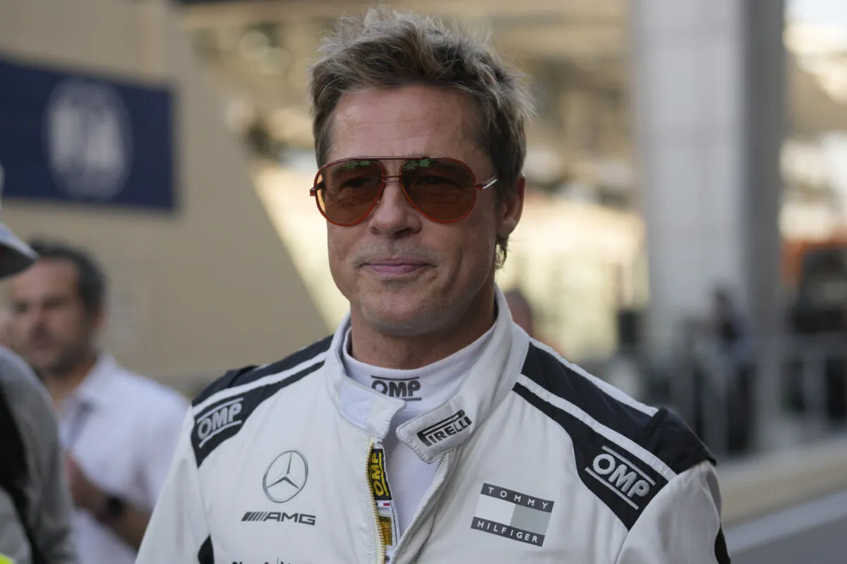 American actor Brad Pitt walks in the pit lane before the Formula One Abu Dhabi Grand Prix at the Yas Marina Circuit in Abu Dhabi, UAE, on Dec. 8, 2024. (AP Photo/Darko Bandic)