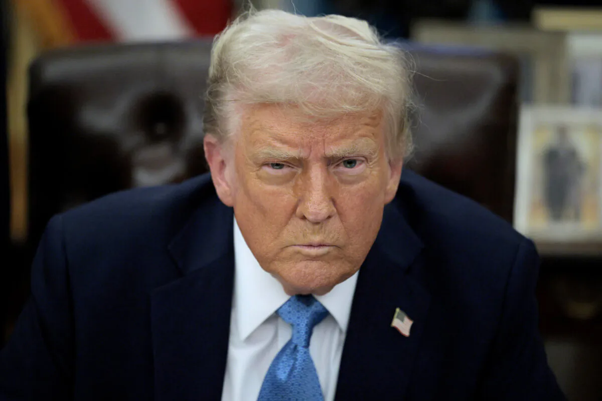 President Donald Trump talks to reporters after signing an executive order, "Unleashing prosperity through deregulation," in the Oval Office on Jan. 31, 2025. (Chip Somodevilla/Getty Images)