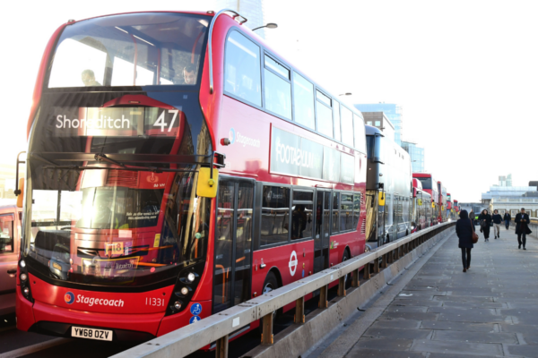 Buses on London Bridge in London, England, on Dec. 11, 2019. (Ian West/PA Wire)