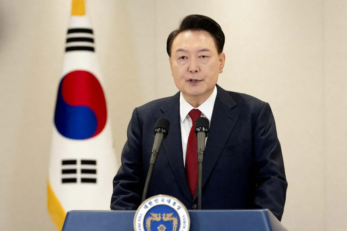 South Korean President Yoon Suk Yeol delivers an address to the nation at the Presidential Office in Seoul, South Korea, on Dec. 12, 2024. (The Presidential Office/Handout via Reuters)