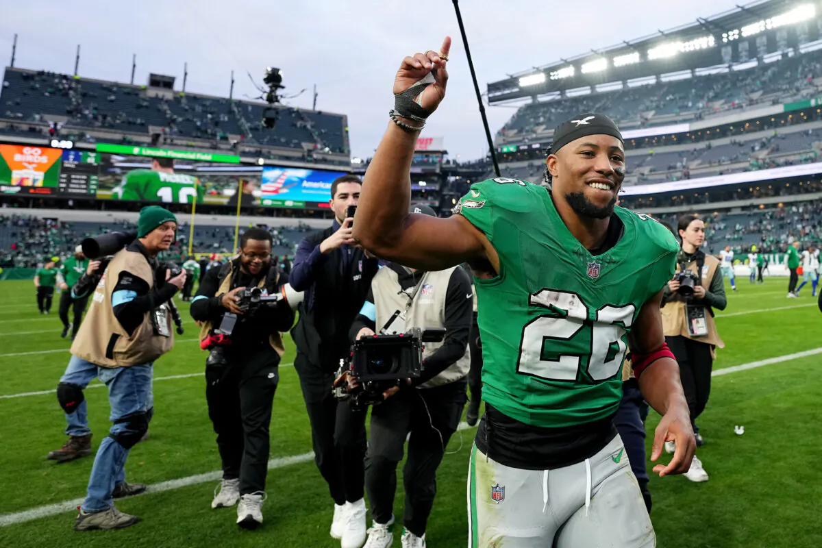 Saquon Barkley of the Philadelphia Eagles runs off the field after a 41-7 victory over the Dallas Cowboys at Lincoln Financial Field in Philadelphia on Dec. 29. (Mitchell Leff/Getty Images)
