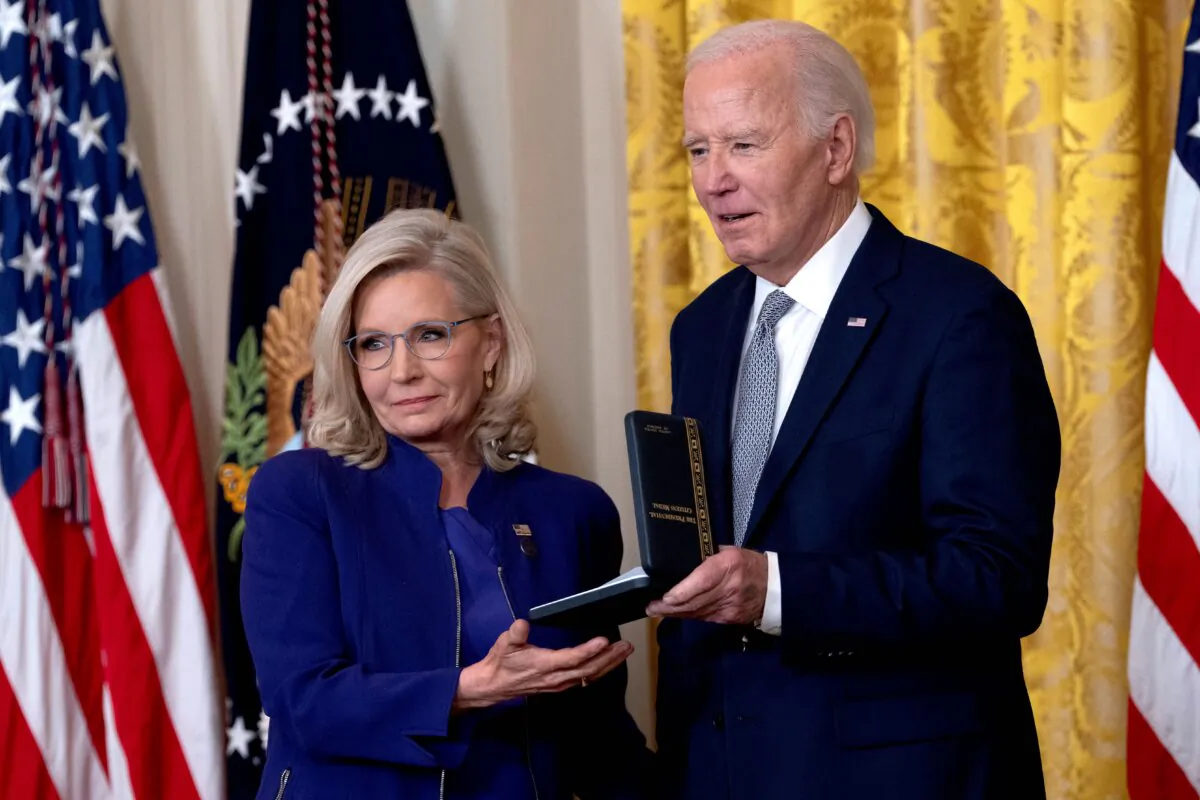 Former Congresswoman Liz Cheney receives the Presidential Citizens Medal from President Joe Biden during a ceremony at the White House on Jan. 2, 2025. (Chris Kleponis/AFP via Getty Images)