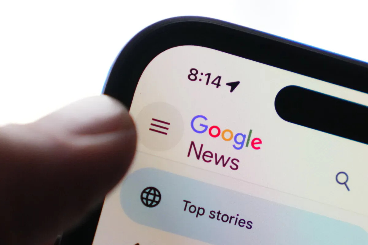 The Google News homepage is displayed on an iPhone in Ottawa on Feb. 28, 2023. (The Canadian Press/Sean Kilpatrick)