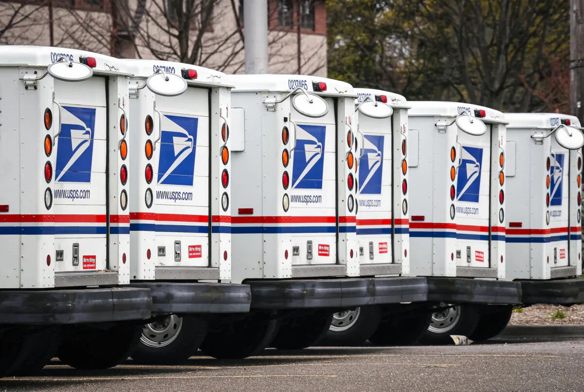 A general view of US Postal Service trucks in Farmingdale, New York, on April 12, 2020. (Bruce Bennett/Getty Images)