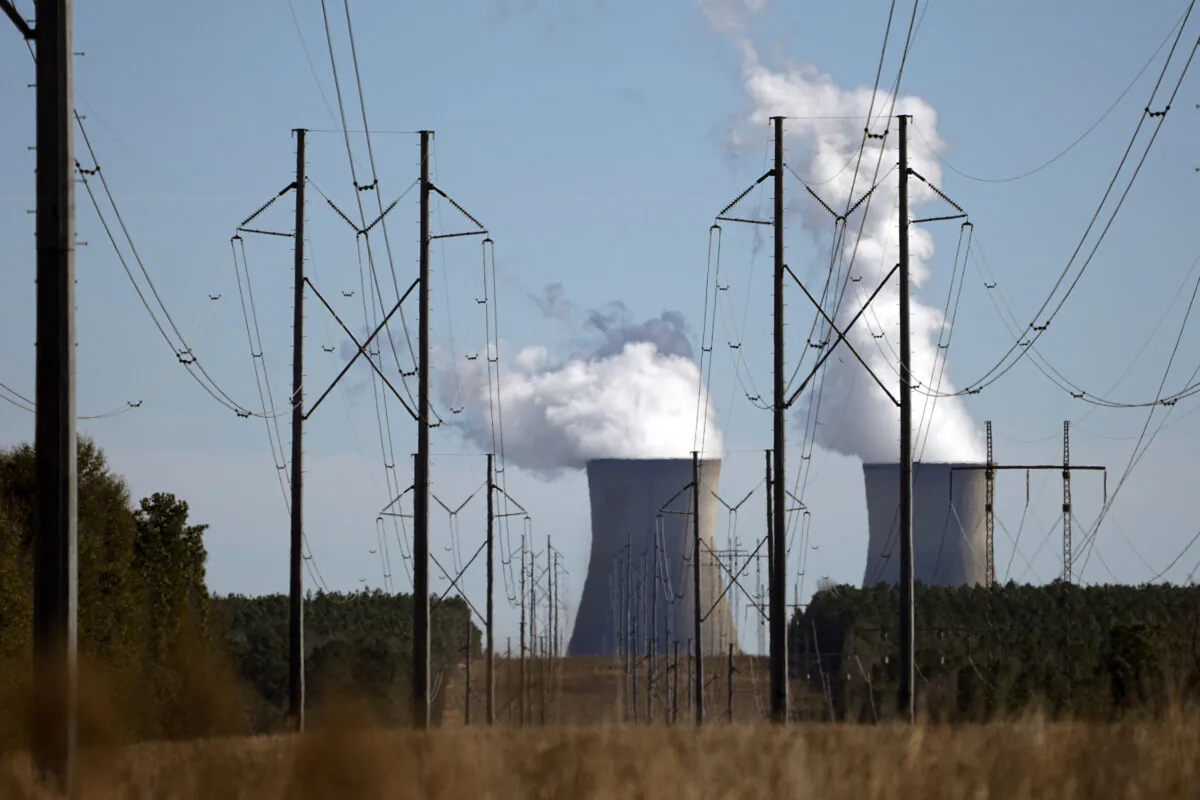 Transmission lines flow at Georgia Power Co.'s Plant Vogtle nuclear power plant, in Waynesboro, Ga., on Jan. 20, 2023. (AP Photo/John Bazemore)