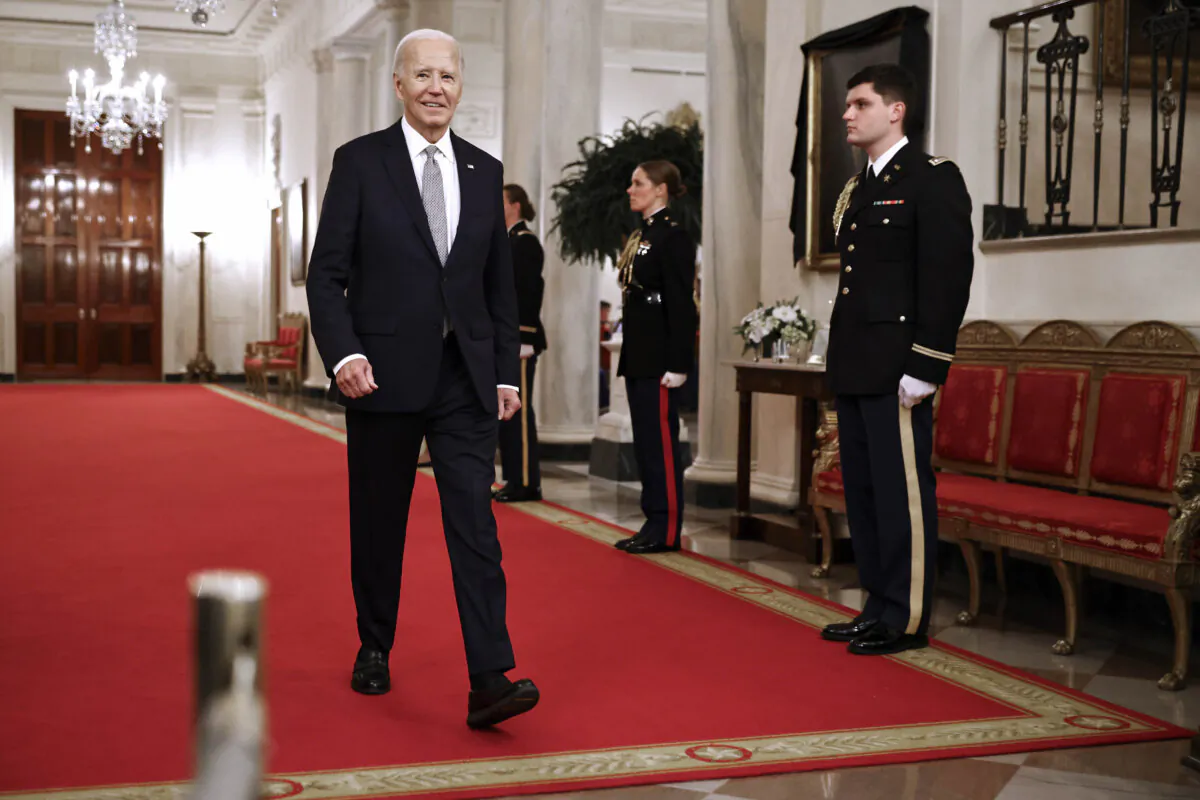 President Joe Biden walks into the East Room to host the Presidential Citizens Medal ceremony at the White House on Jan. 2, 2025. (Chip Somodevilla/Getty Images)