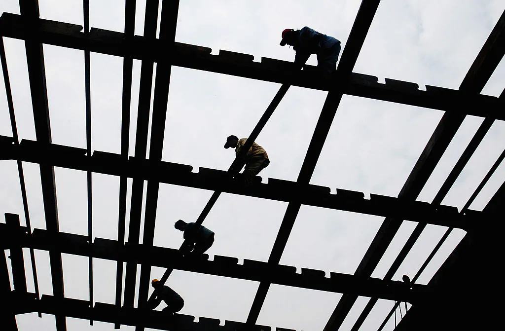 Workers build the keel of a ship at the state-owned Guangzhou Shipyard Guangdong Province, southern China, in a file photo. (China Photos/Getty Images)