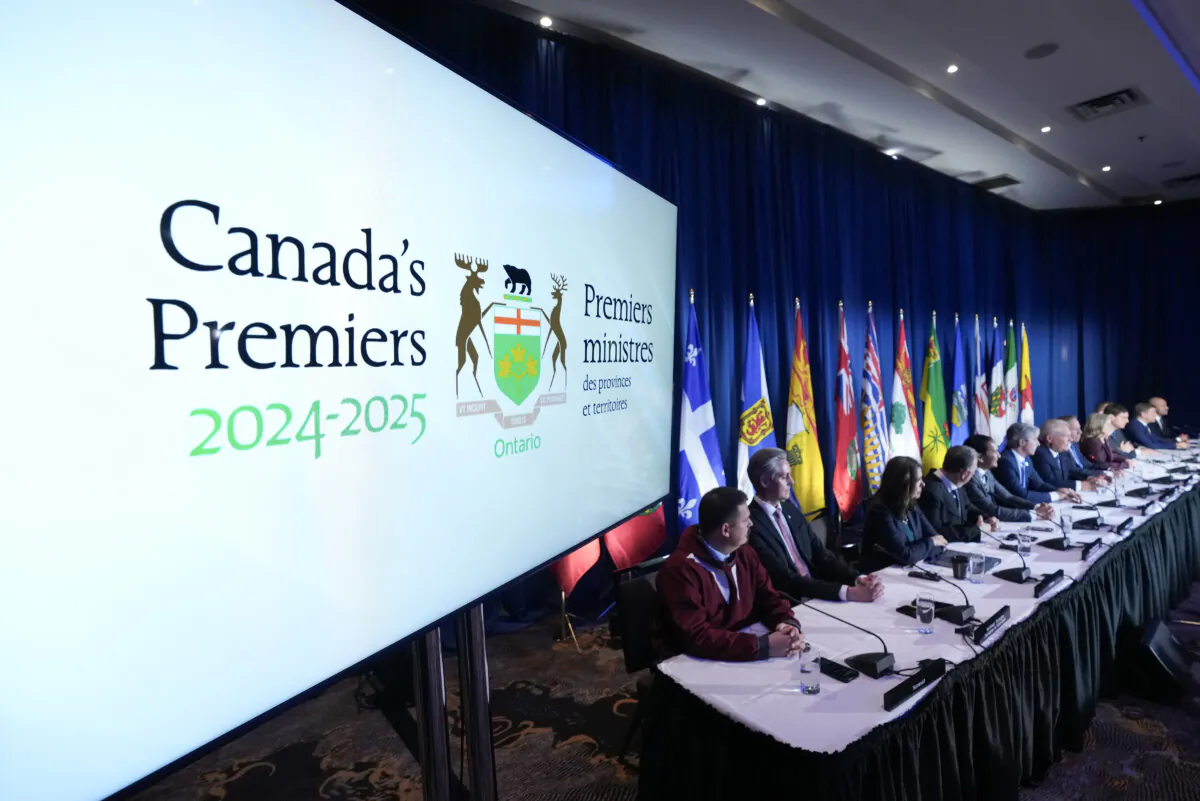 Canada’s premiers speak to the media during the fall premiers’ meeting in Toronto on Dec. 16, 2024. (The Canadian Press/Nathan Denette)