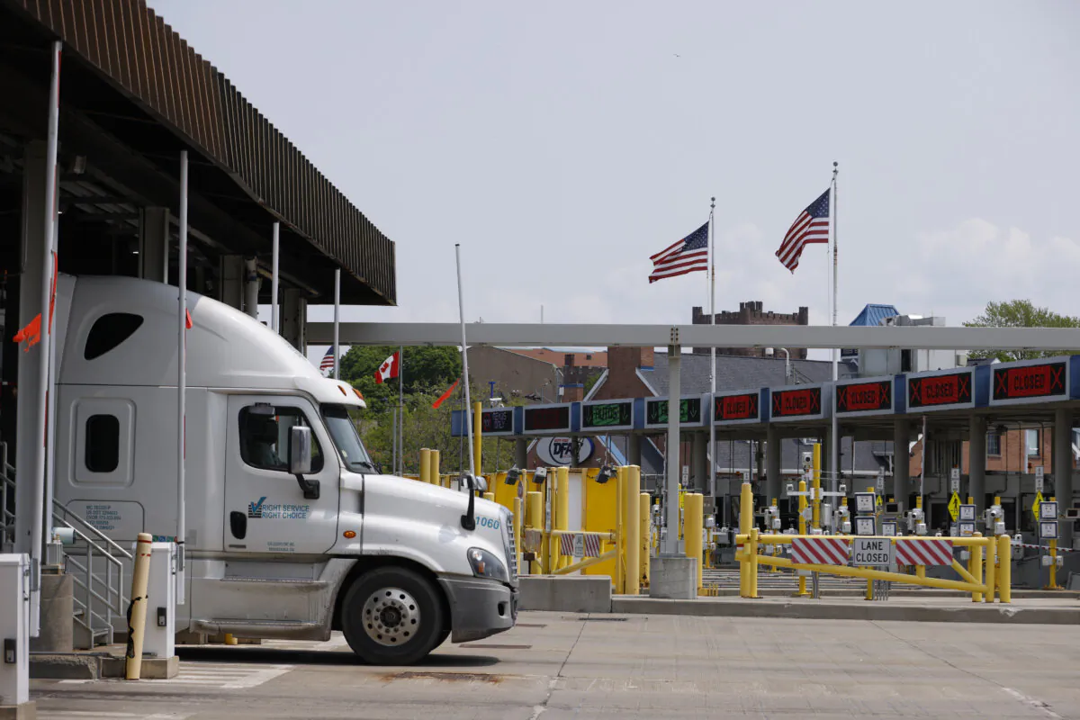 Commercial trucks pass through the Peace Bridge Port of Entry in Buffalo, N.Y., on May 23, 2023. (The Canadian Press/Cole Burston)