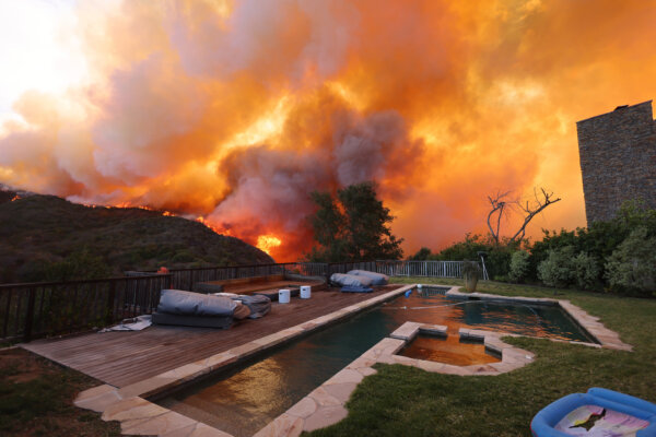Thousands of Californians Flee Massive Palisades Fire Fueled by Strong Winds