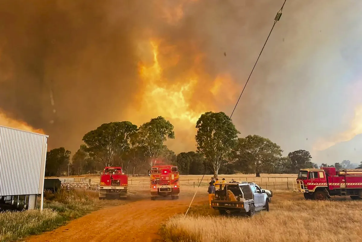 A supplied image shows CFA firetrucks near an out of control bushfire in the Grampians National park, Victoria on Dec. 23, 2024. (AAP Image/Supplied by CFA)