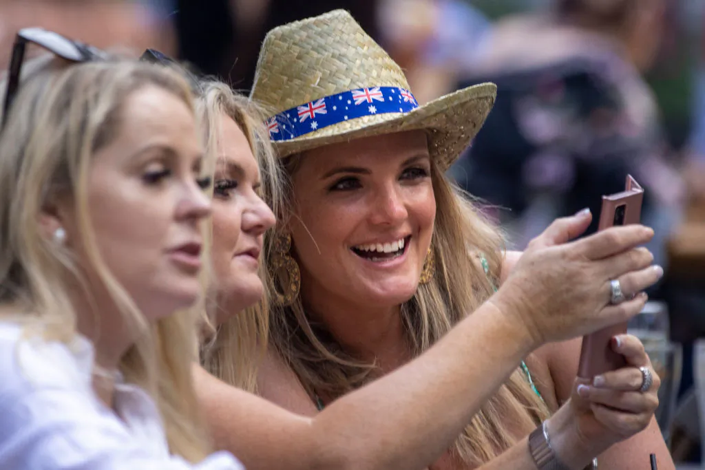 Women take a selfie at The Mercantile Hotel in The Rocks in Sydney, Australia, on Jan. 26, 2021. (Jenny Evans/Getty Images)