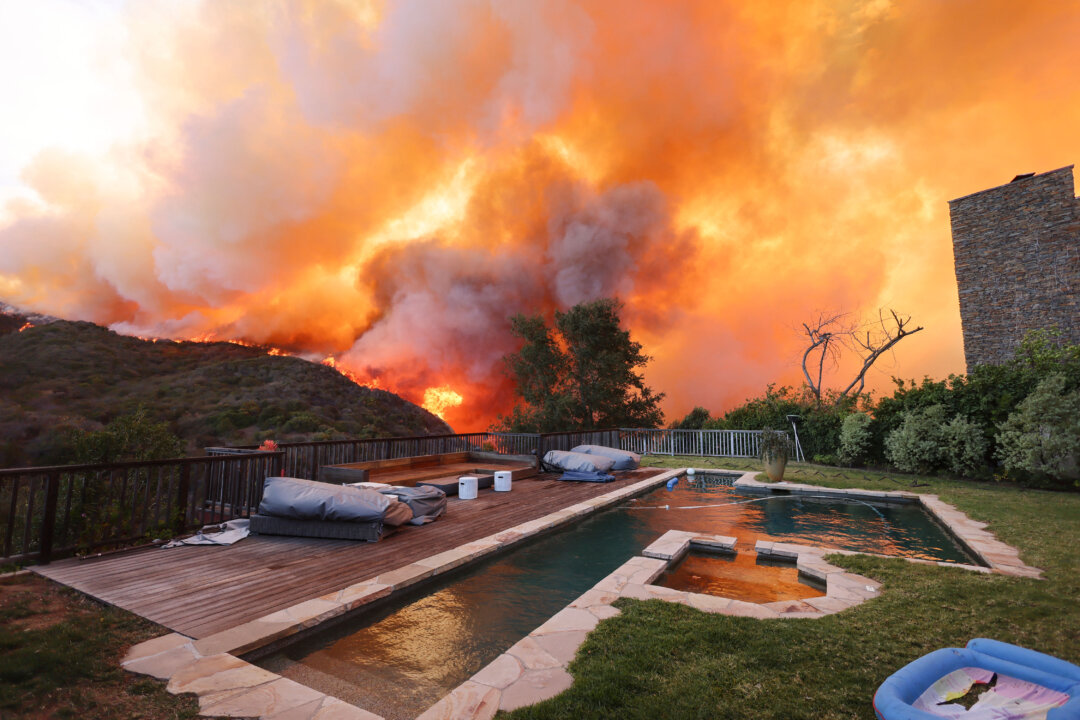 Thousands of Californians Flee Massive Palisades Fire Fueled by Strong Winds