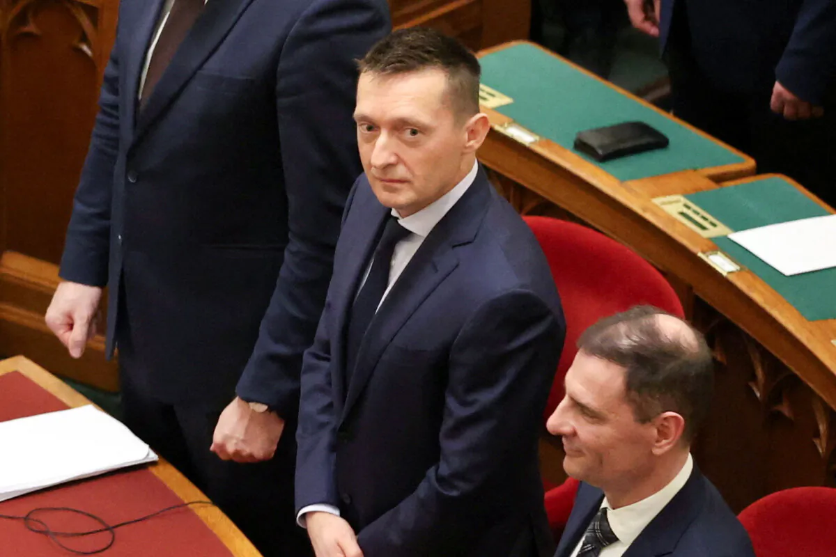 Antal Rogan, Cabinet chief minister, is seen as the newly elected Hungarian President Tamas Sulyos takes his oath in the parliament building in Budapest, Hungary, on Feb. 26, 2024. (Bernadett Szabo/Reuters)