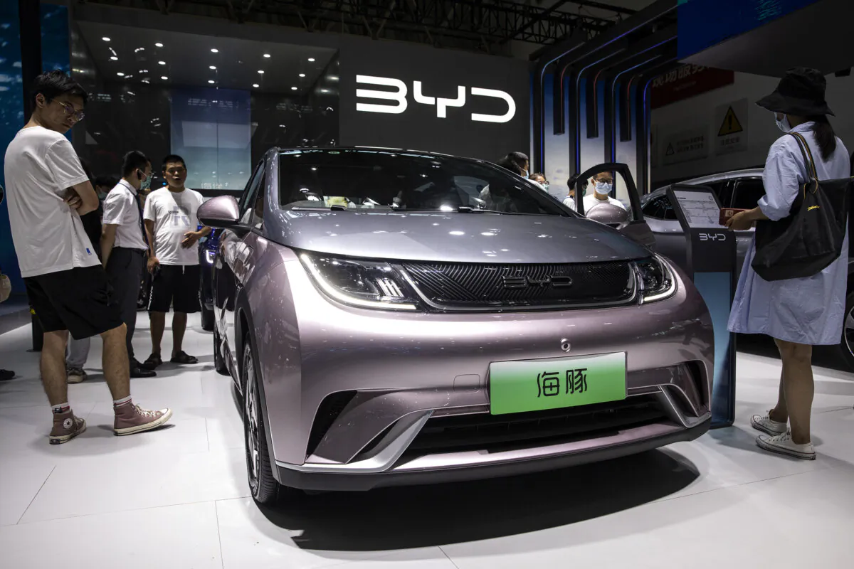 Attendees look at a BYD Dolphin during the 2022 Central China International Auto Show in Wuhan, Hubei Province, China, on July 14, 2022. (Getty Images)