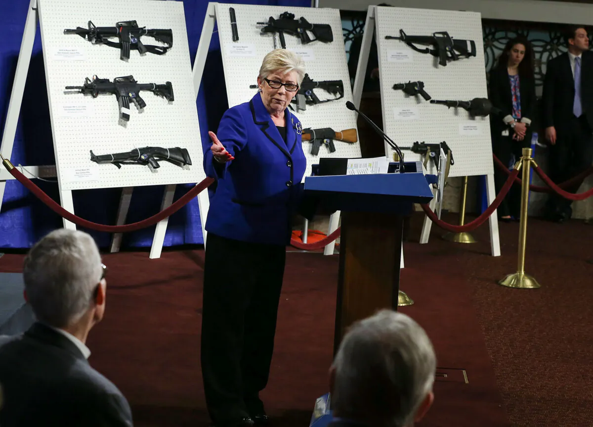 U.S. Representative Carolyn McCarthy (D-N.Y.) speaks next to a display of assault weapons during a news conference Jan. 24, 2013, on Capitol Hill in Washington. (Alex Wong/Getty Images)