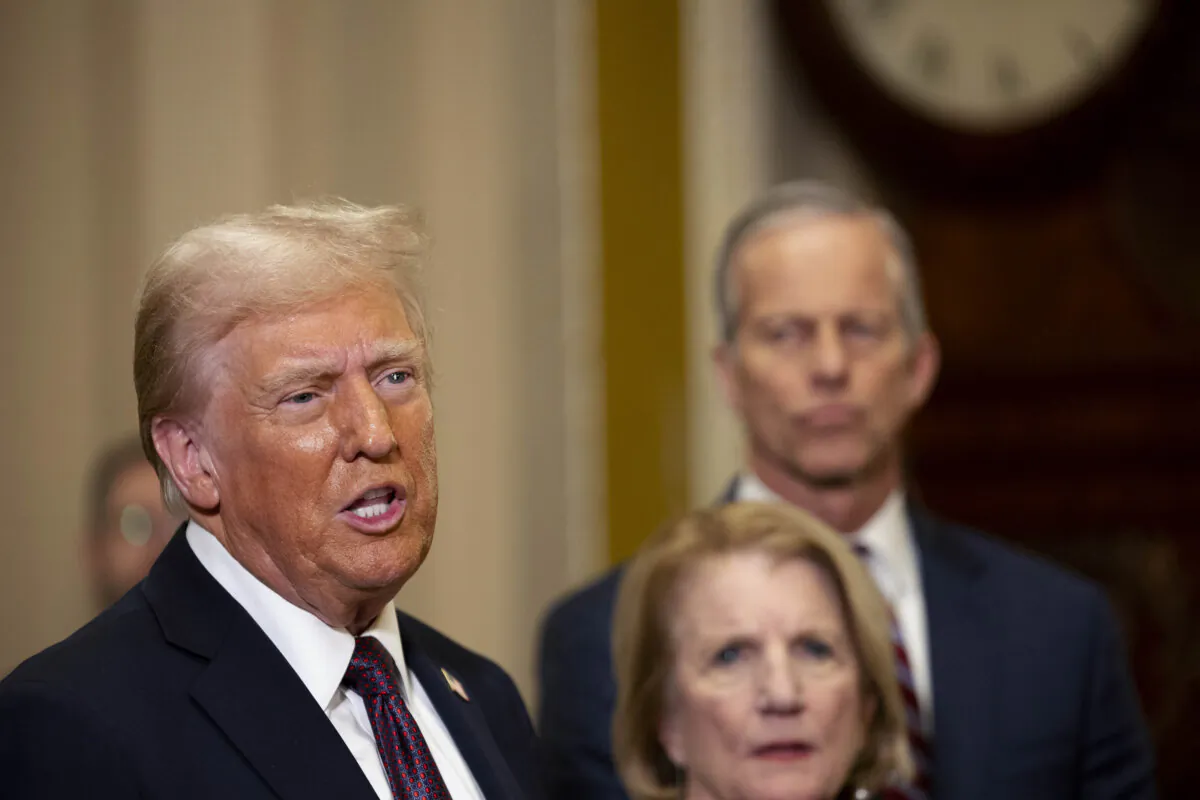 President-elect Donald Trump speaks to the media as Sen. Shelley Moore Capito (R-W.Va.) and Senate Majority Leader John Thune (R-S.D.) look on at the U.S. Capitol in Washington on Jan. 8, 2025. (Tasos Katopodis/Getty Images)