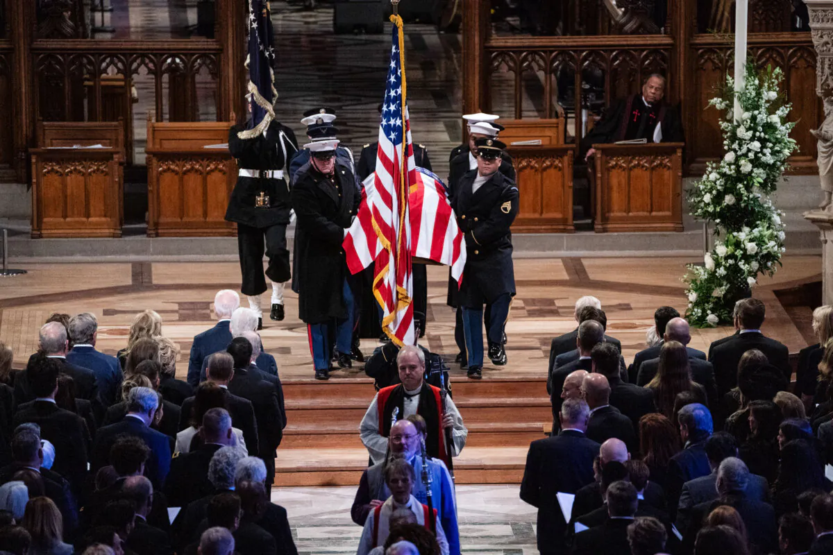 The casket of former U.S. President Jimmy Carter is carried out of the National Cathedral in Washington after his state funeral on Jan. 9, 2025. (Haiyun Jiang/POOL/AFP via Getty Images)